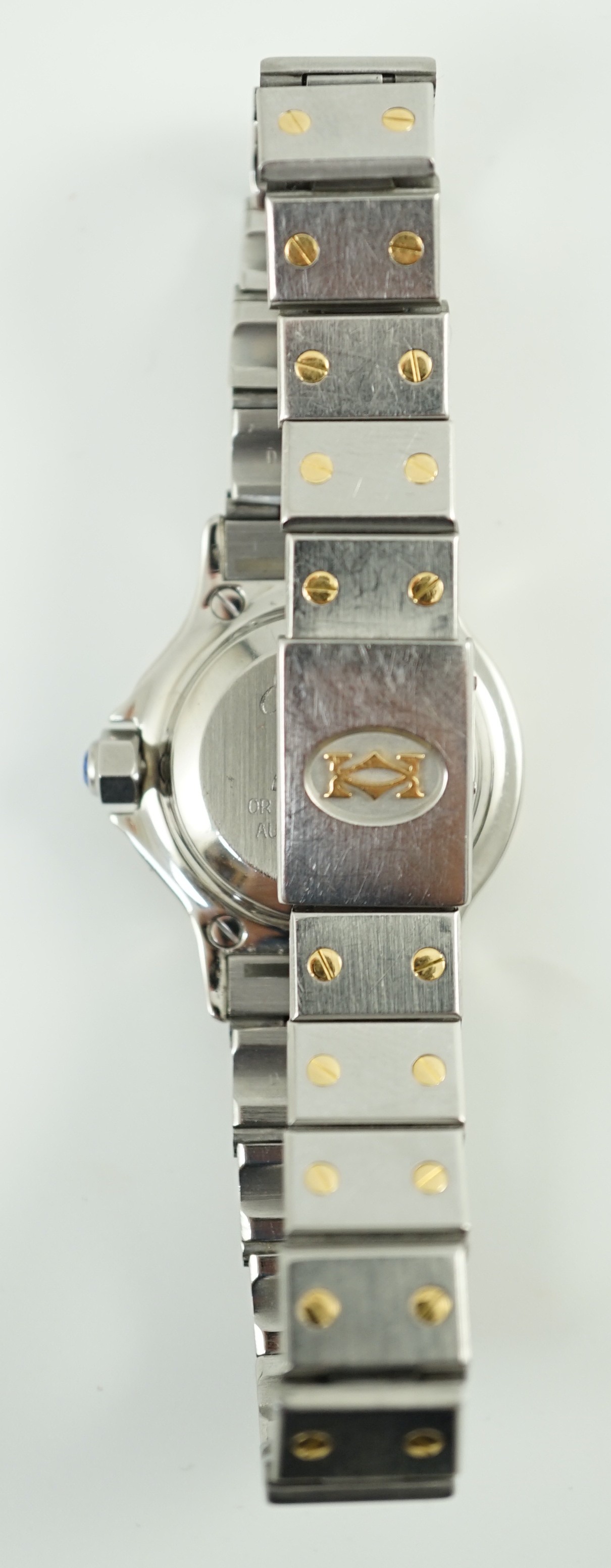 A lady's modern steel and gold Cartier Santos Ronde manual wind wrist watch, on Cartier bracelet with deployment clasp